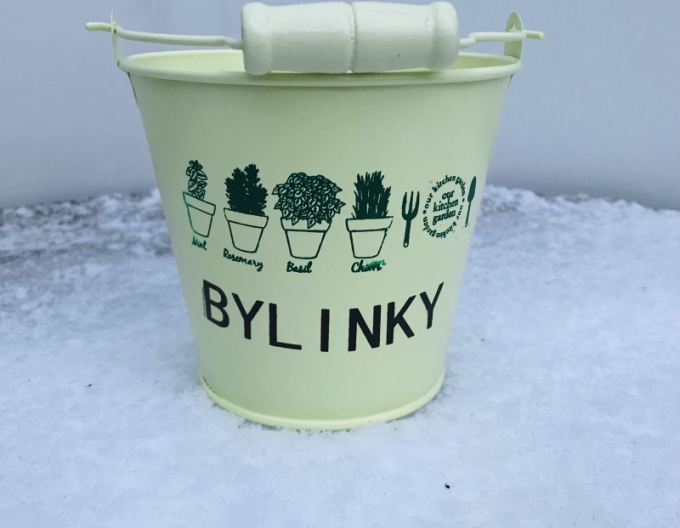 Kräutertopf aus Metall in Gelb